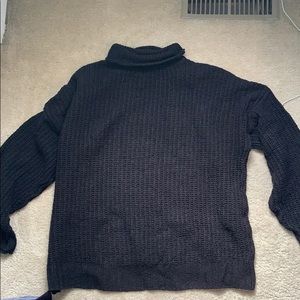 Oversized black cable knit sweater